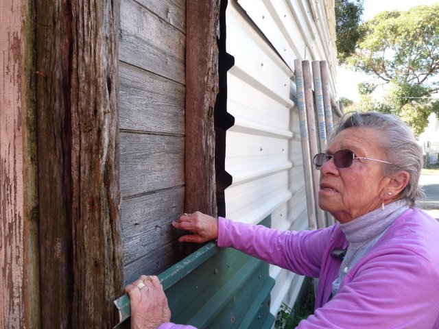 Under the tin, Margaret Slowgrove discovers the original timber weatherboards of her childhood home, Botany